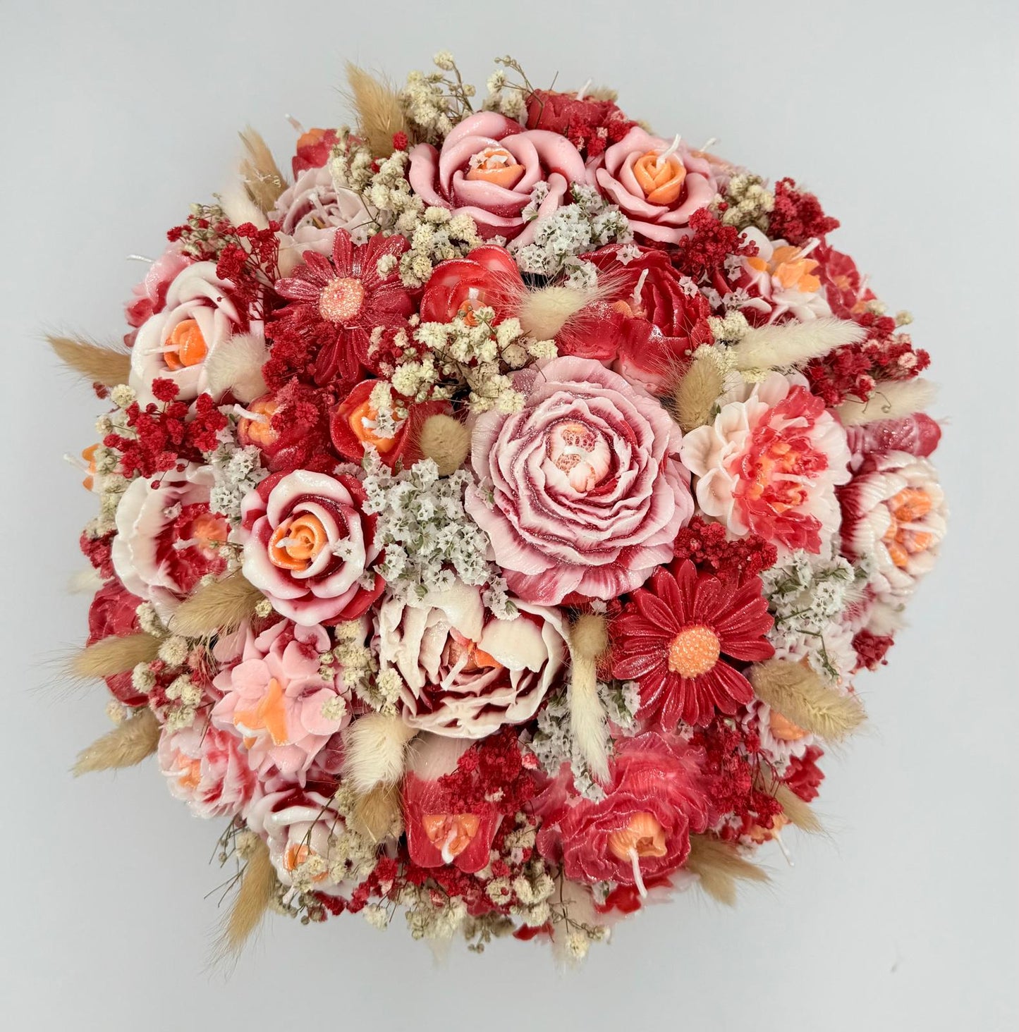 Bloemen - en kaarsenboeket