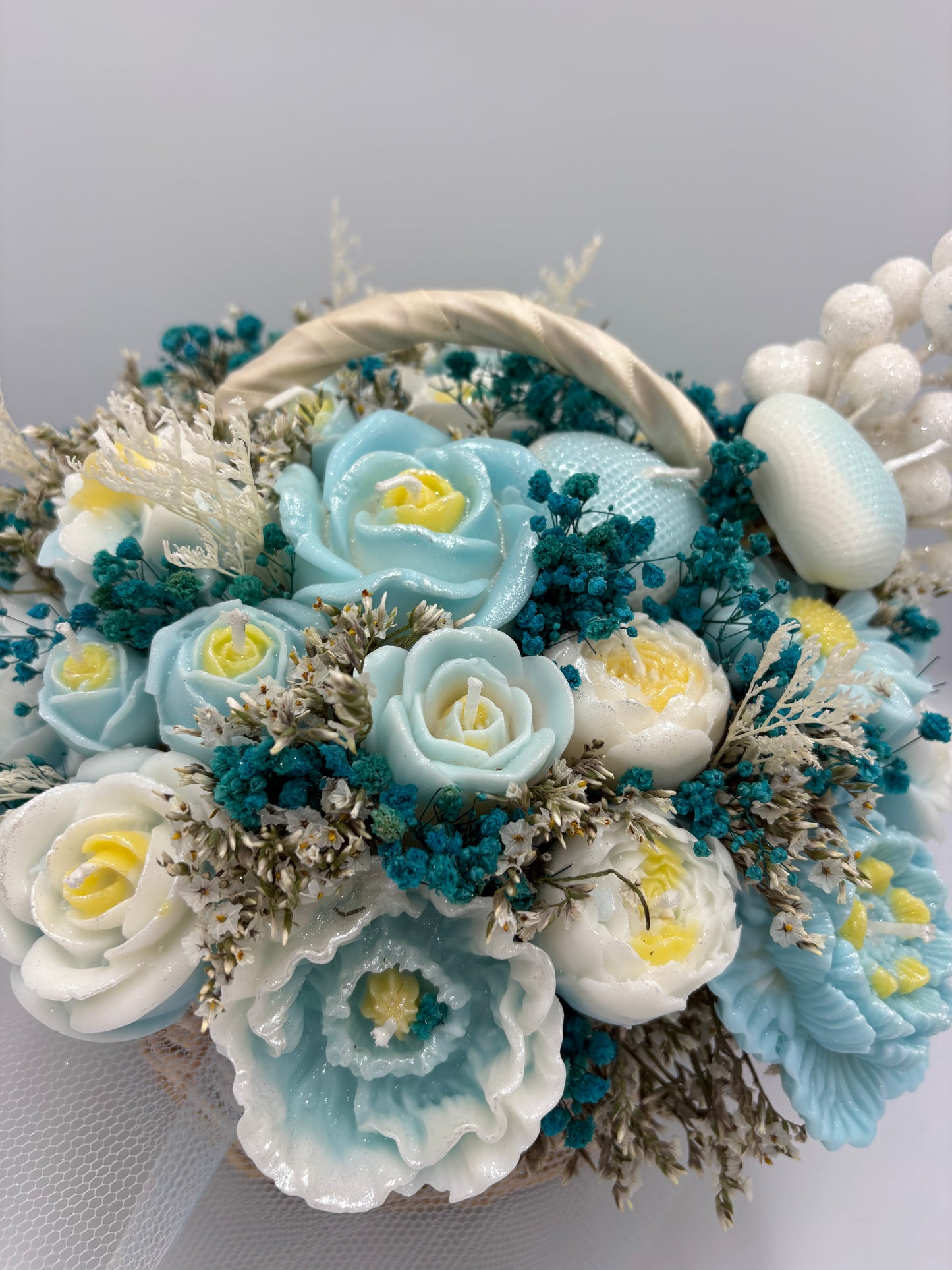 Bloemen - en kaarsenboeket