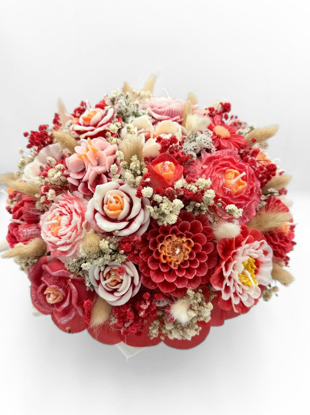 Bloemen - en kaarsenboeket